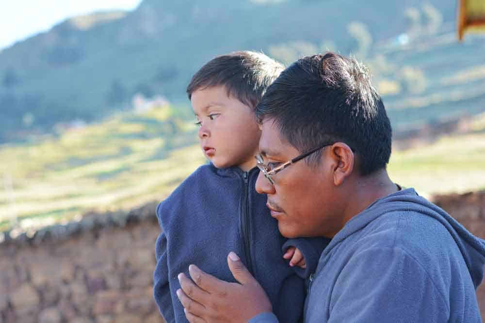 man with son in countryside