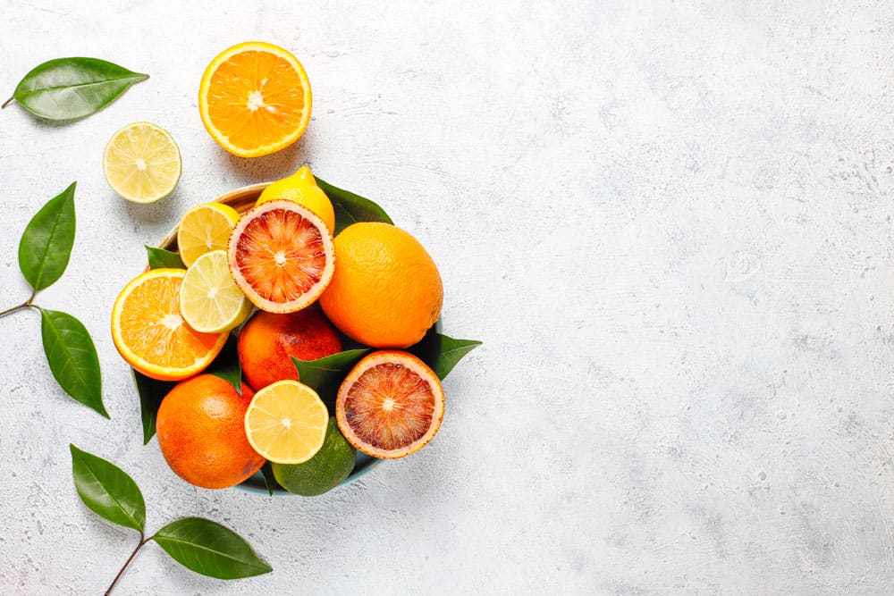 citrus-background-with-assorted-fresh-citrus-fruits