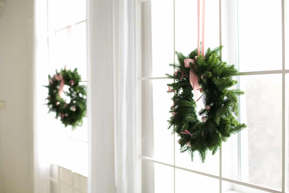 christmas-wreaths-hanging-windows