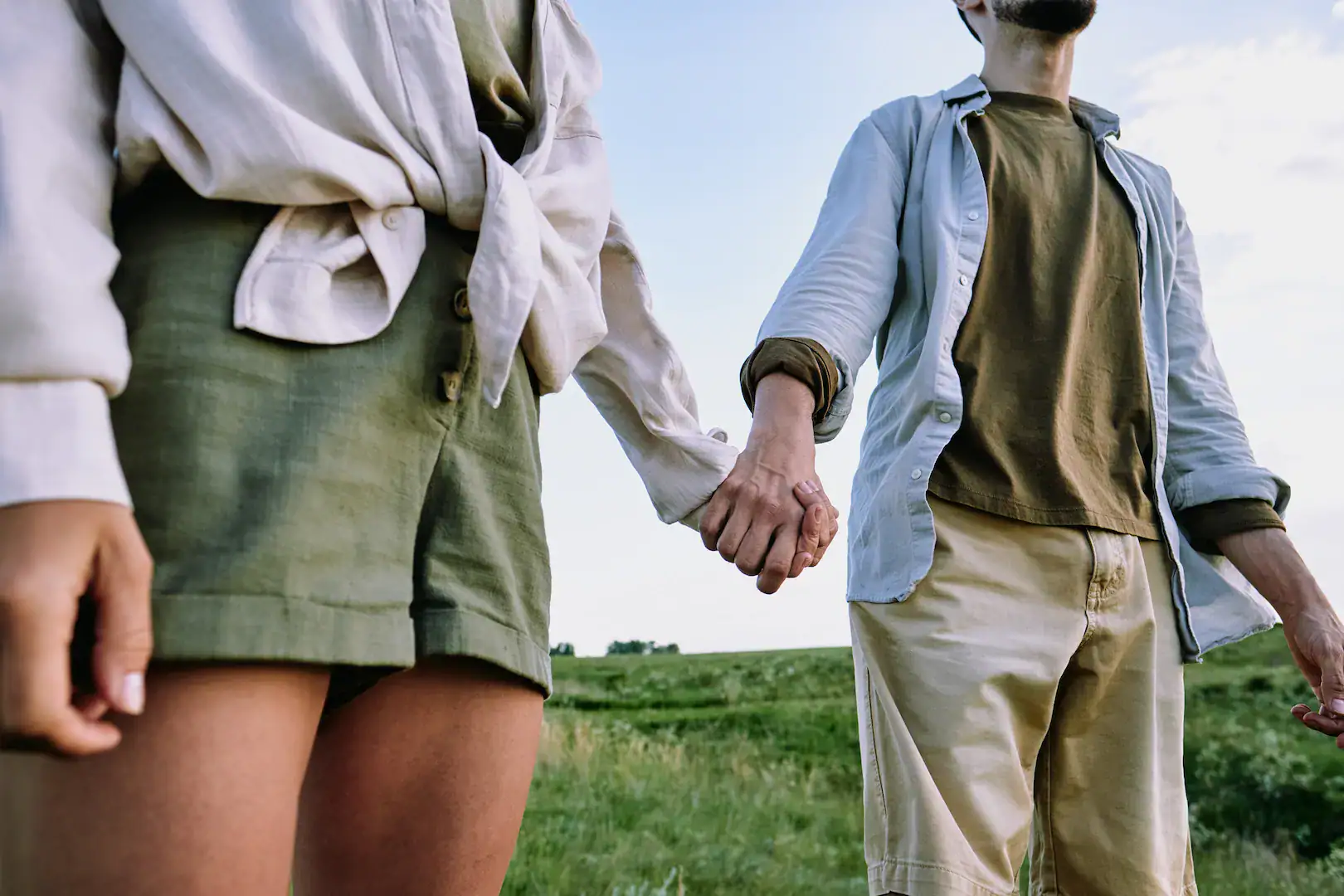 travelling couple holding hands in hills 2021 09 24 03 10 08 utc