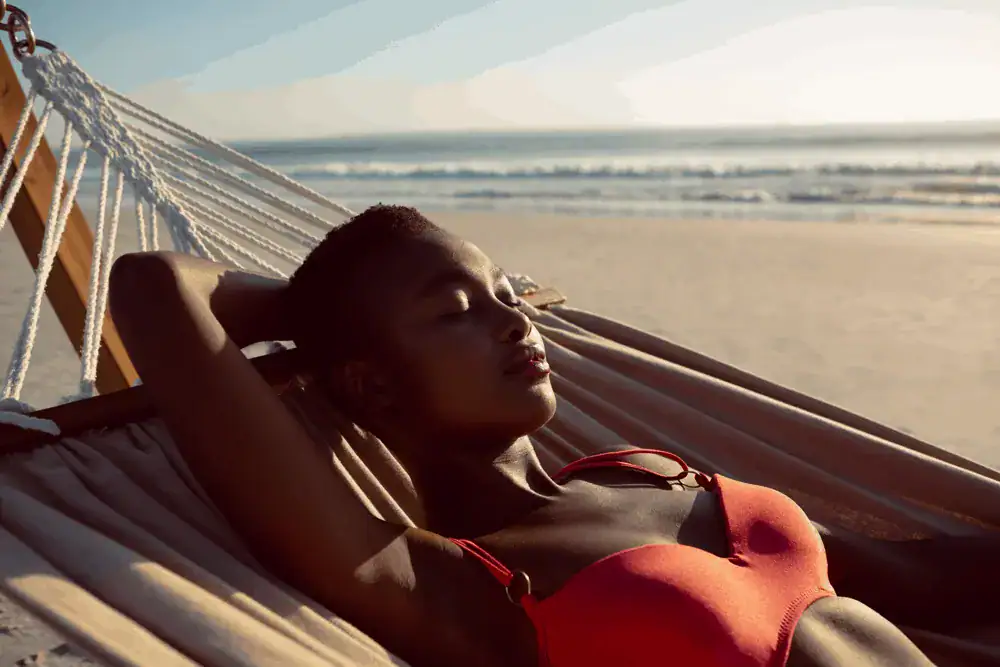 woman sleeping in hammock woman sleeping in hammock